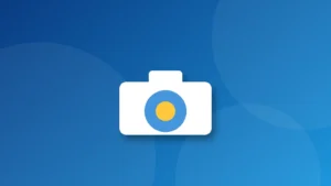 Ảnh bìa minh họa: biểu tượng camera trên nền laptop Windows